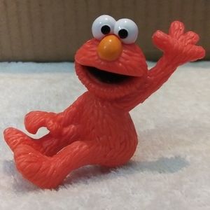 Seasame Street Tickle Me Elmo figure with peg solid plastic